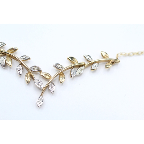 131 - 9ct white and yellow diamond vine branch necklace (2.8g)