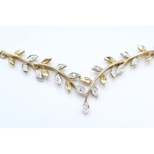 131 - 9ct white and yellow diamond vine branch necklace (2.8g)