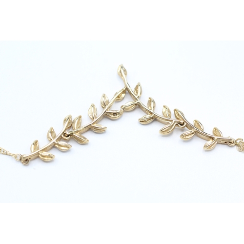 131 - 9ct white and yellow diamond vine branch necklace (2.8g)