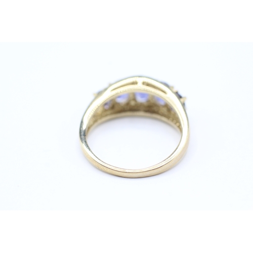 141 - 9ct gold blue gemstone boat ring (3.3g) Size M 1/2