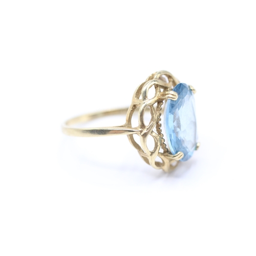 146 - 9ct gold blue gemstone cocktail ring (3.6g) Size Q 1/2