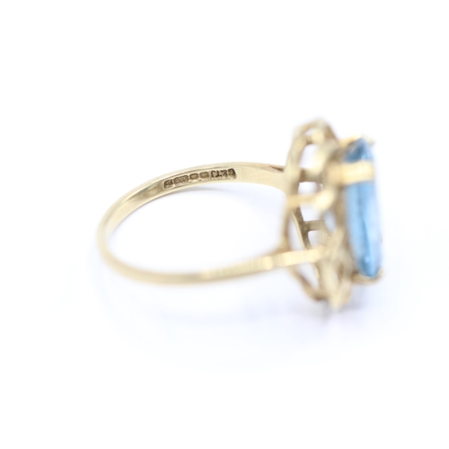 146 - 9ct gold blue gemstone cocktail ring (3.6g) Size Q 1/2