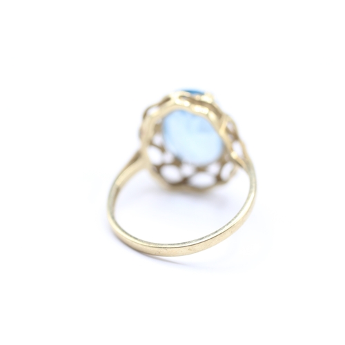 146 - 9ct gold blue gemstone cocktail ring (3.6g) Size Q 1/2