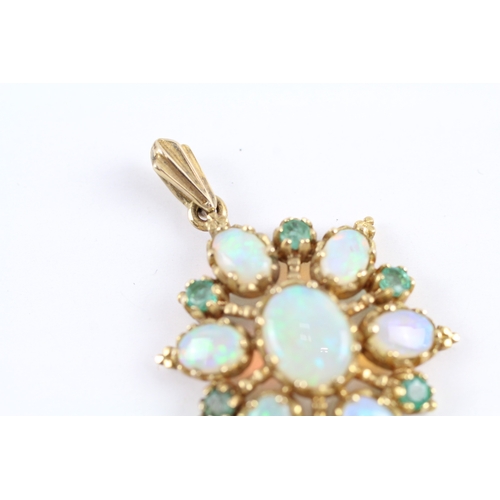 147 - 9ct gold opal & emerald starburst pendant (4.5g)