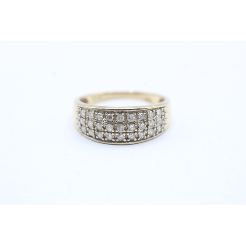 153 - 9ct gold diamond three row eternity ring (2.8g) Size T