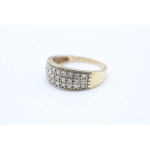 153 - 9ct gold diamond three row eternity ring (2.8g) Size T