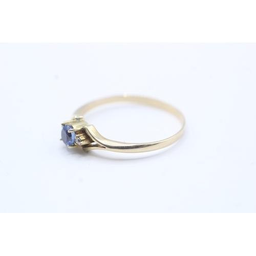 159 - 9ct gold blue gemstone & diamond dress ring (1.6g) Size R