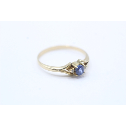 159 - 9ct gold blue gemstone & diamond dress ring (1.6g) Size R