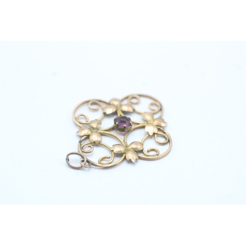 160 - 9ct gold Edwardian purple gemstone floral pendant (2g)