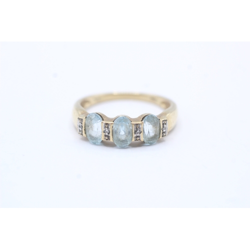 167 - 9ct gold blue gemstone & diamond dress ring (2.5g) Size P