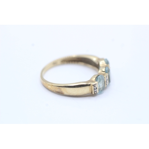 167 - 9ct gold blue gemstone & diamond dress ring (2.5g) Size P