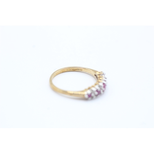 173 - 9ct gold ruby & diamond half eternity ring (1.8g)