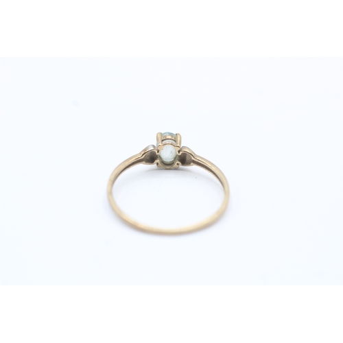 177 - 9ct gold oval cut blue gemstone solitaire ring (0.8g) Size O