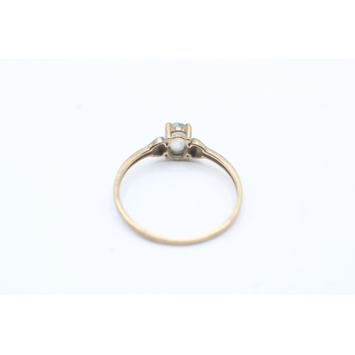 177 - 9ct gold oval cut blue gemstone solitaire ring (0.8g) Size O