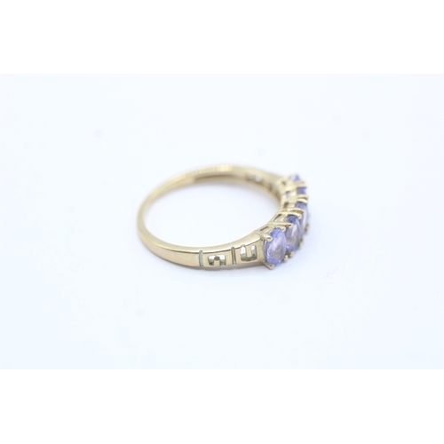 180 - 9ct gold oval cut tanzanite five stone ring (1.7g) Size M 1/2