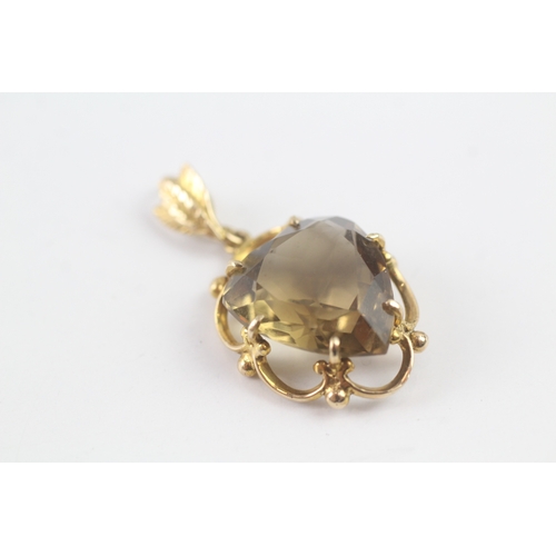 189 - 9ct gold smokey quartz heart pendant (4.7g)