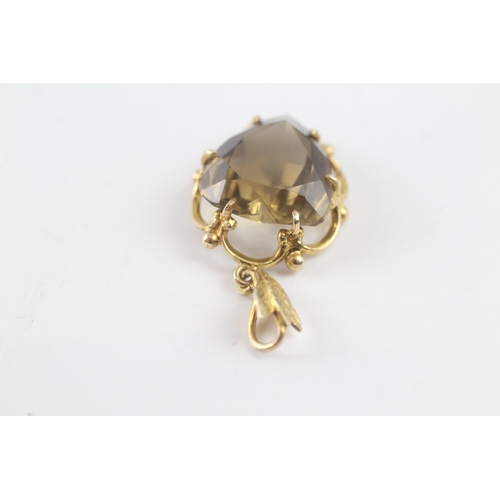 189 - 9ct gold smokey quartz heart pendant (4.7g)