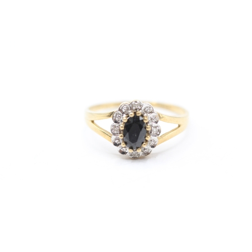 192 - 9ct gold diamond and sapphire halo ring (2g) Size Q