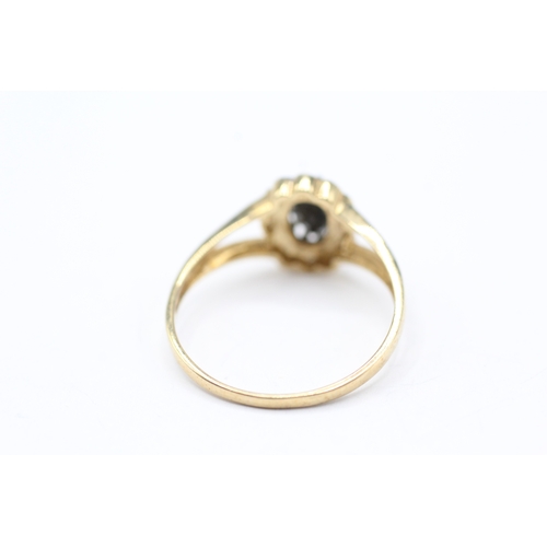 192 - 9ct gold diamond and sapphire halo ring (2g) Size Q