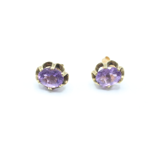 193 - 9ct gold amethyst stud earrings (2.7g)