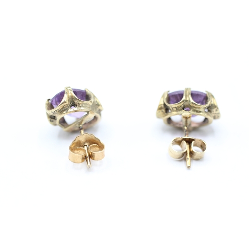 193 - 9ct gold amethyst stud earrings (2.7g)