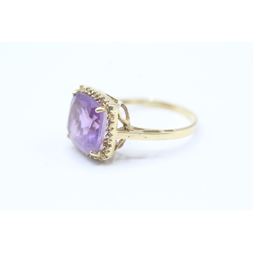 196 - 10ct gold amethyst & diamond dress ring (2.9g) Size N