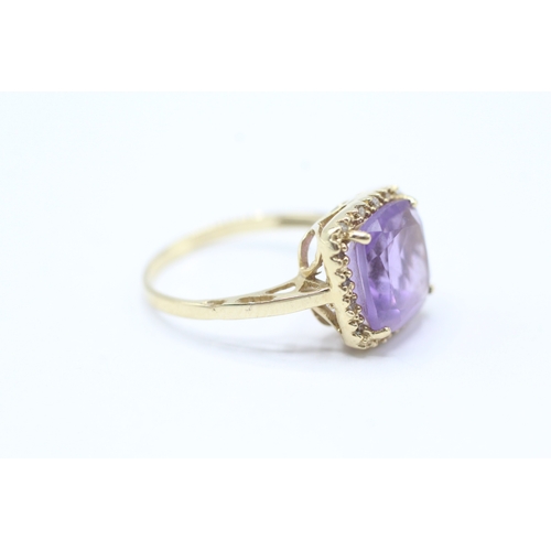 196 - 10ct gold amethyst & diamond dress ring (2.9g) Size N