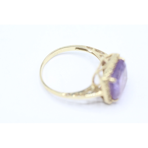 196 - 10ct gold amethyst & diamond dress ring (2.9g) Size N