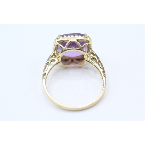 196 - 10ct gold amethyst & diamond dress ring (2.9g) Size N