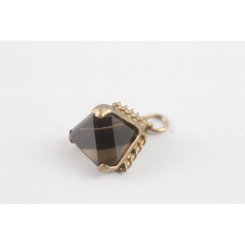 197 - 9ct gold smokey quartz pyramid fob (3.9g)