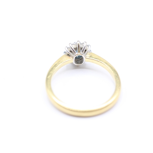 217 - 18ct gold diamond and blue gemstone halo ring (4g) Size O 1/2