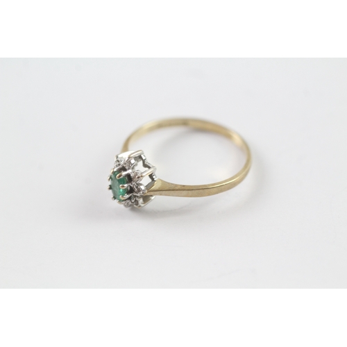 22 - 9ct gold emerald and diamond halo dress ring (1.4g) Size N