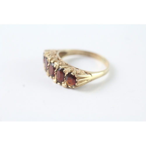 221 - 9ct gold garnet ring (3.9g) Size P