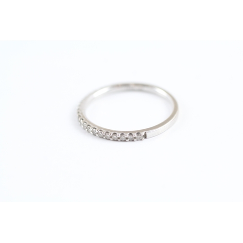 228 - 18ct white gold diamond half eternity ring (1.7g) Size L