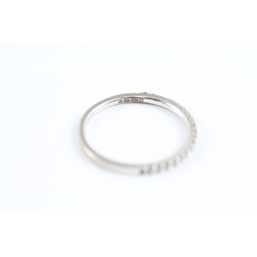 228 - 18ct white gold diamond half eternity ring (1.7g) Size L