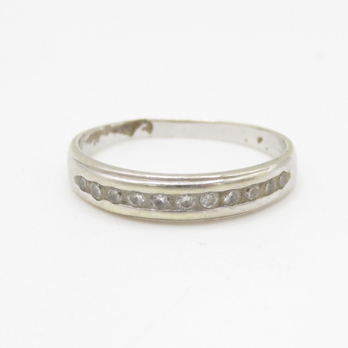 124 - 9ct gold diamond half eternity ring (1.8g) Size O