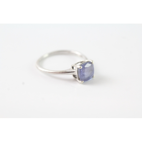 234 - 9ct white gold tanzanite solitaire dress ring (1.5g) Size J