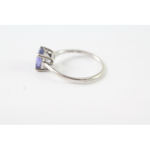 234 - 9ct white gold tanzanite solitaire dress ring (1.5g) Size J