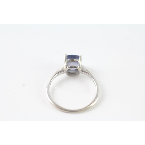 234 - 9ct white gold tanzanite solitaire dress ring (1.5g) Size J