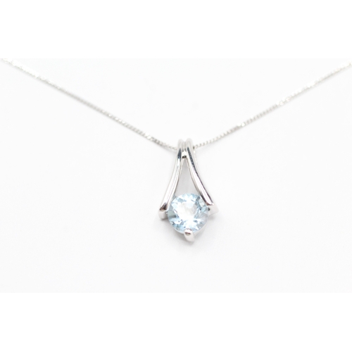 236 - 9ct white gold topaz drop pendant on chain (1.2g)