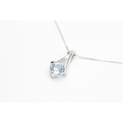 236 - 9ct white gold topaz drop pendant on chain (1.2g)