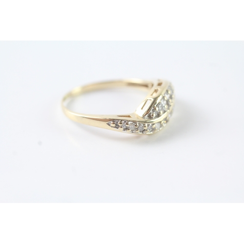 239 - 9ct gold diamond dress ring (2.9g) Size P