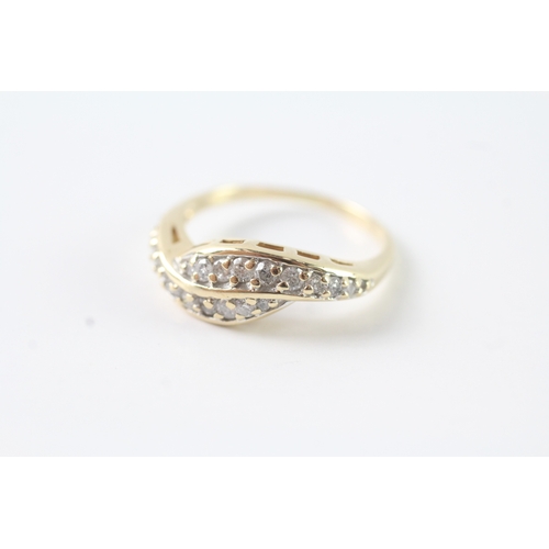 239 - 9ct gold diamond dress ring (2.9g) Size P