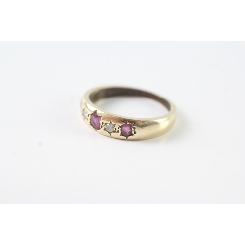 242 - 9ct gold ruby & diamond star set dress ring (2.4g) Size L