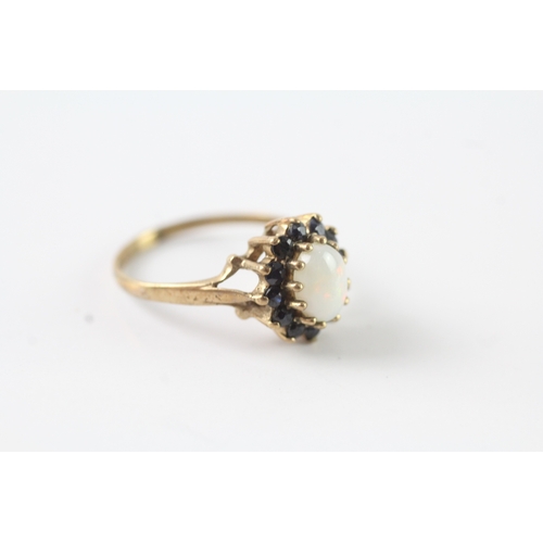 243 - 9ct gold opal & sapphire cluster dress ring (2g) Size K