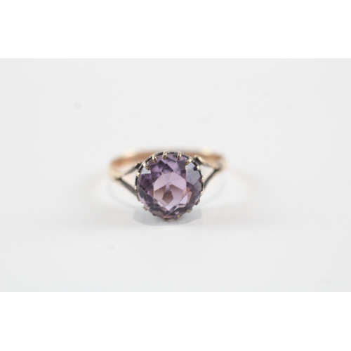 245 - 9ct gold amethyst solitaire dress ring (1.7g) Size L