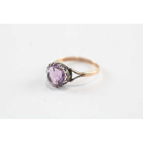 245 - 9ct gold amethyst solitaire dress ring (1.7g) Size L