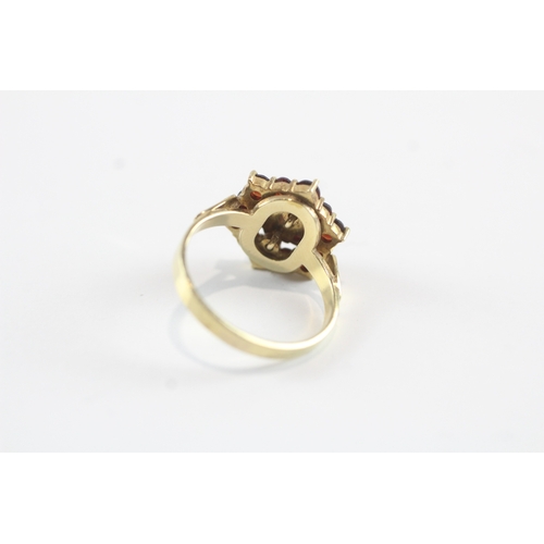 247 - 9ct gold garnet cluster cocktail ring (4.5g) Size M