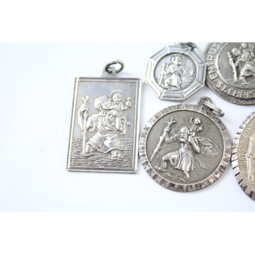 265 - Collection of Sterling Silver St Christopher Pendants inc. Georg Jensen x 7 37g