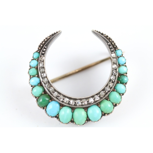 29 - 9ct white gold turquoise & diamond crescent brooch (7g)